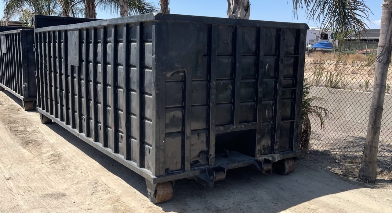 Black roll-off container