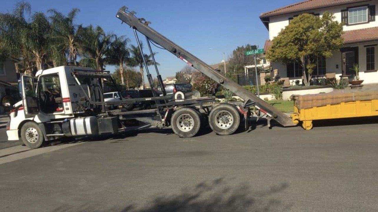 RDO truck delivering a lowboy container