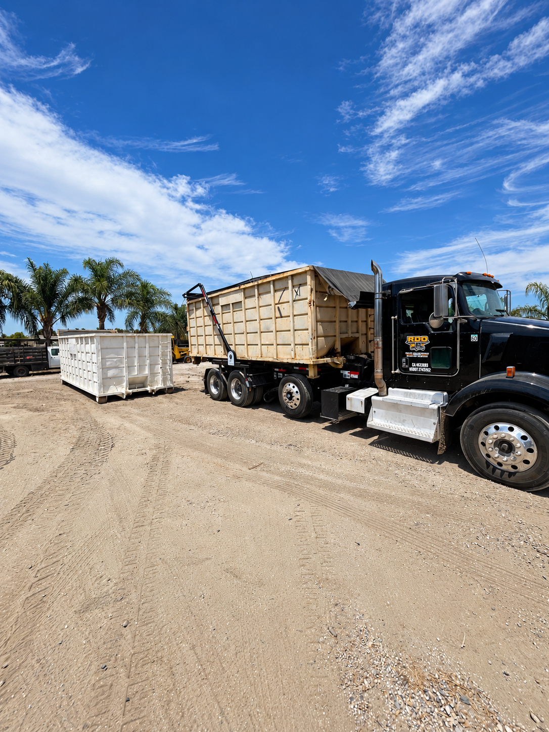 RDO roll-off truck with containers