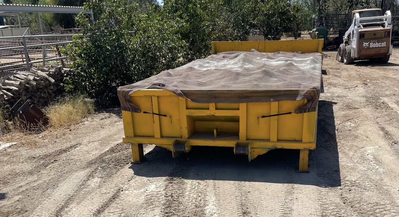 Yellow lowboy container